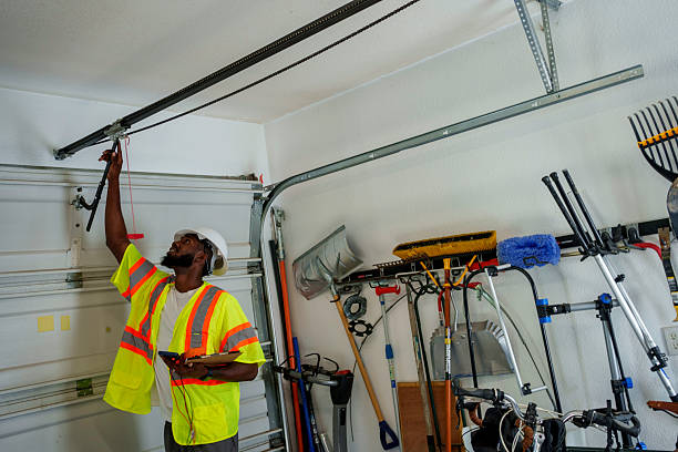 Professional Garage Door technician working in Campbell, OH